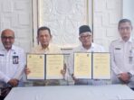 1000998640 Penandatanganan berita acara serah terima dua aset daerah oleh Gubernur Kepri, Ansar Ahmad bersama Wali Kota Tanjungpinang, Lis Darmansyah. Foto: Ist