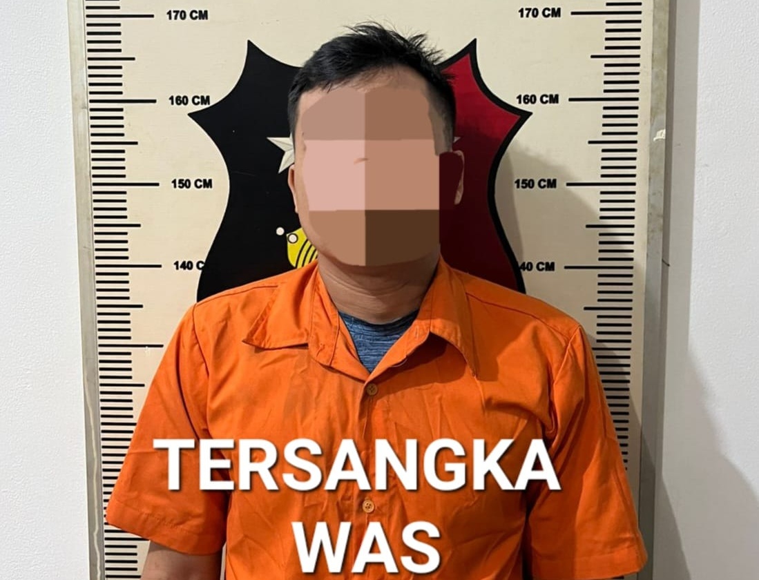 WAS, pelaku kasus dugaan penganiayaan kepada seorang driver ojol di Batam saat diamankan polisi. Foto: Dok Polsek Bengkong